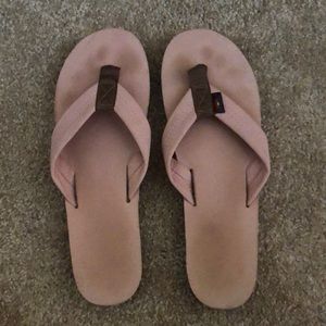 light pink rainbow flip flops